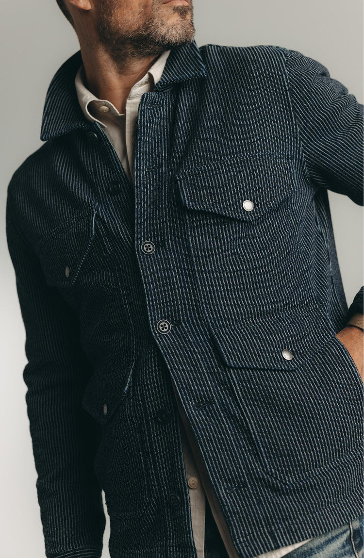 fit model posing in The Jackson Jacket in Rinsed Indigo French Terry Stripe