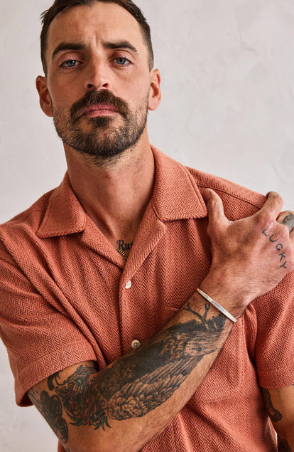 Our model standing in The Latigo Shirt in Copper Herringbone