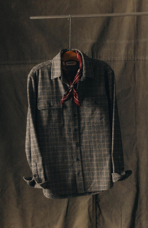 editorial image of The Ledge Shirt in Coal Plaid hanging