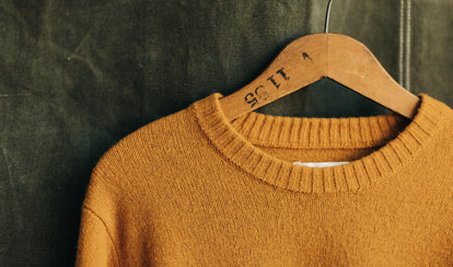 Close up of The Lodge Sweater in Gold