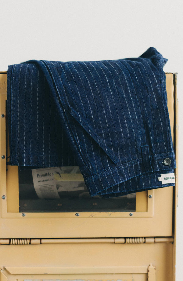 editorial image of The Mariner Jean in Rinsed Indigo Dobby Denim folded