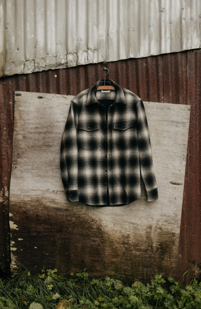 editorial image of The Maritime Shirt Jacket in Olive Plaid hanging