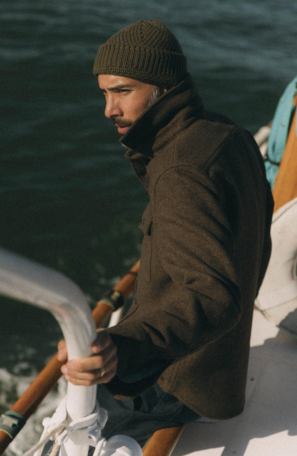 fit model sitting wearing The Maritime Shirt Jacket in Ranger Twill Wool