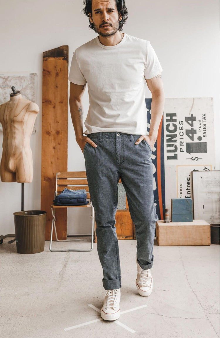 Our model wearing The Morse Pant in Washed Indigo Stripe