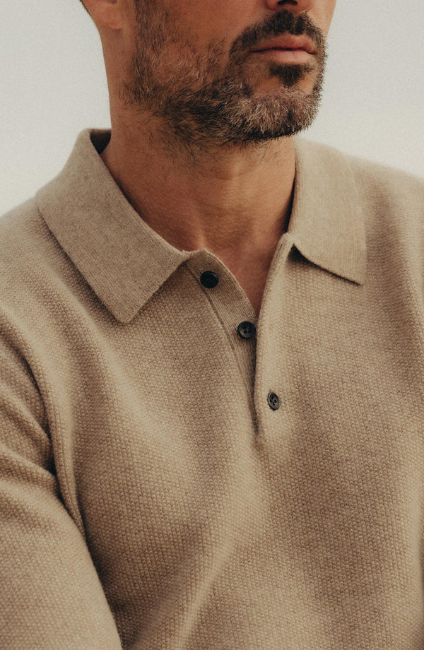 fit model showing off The Newton Sweater Polo in Heather Oatmeal