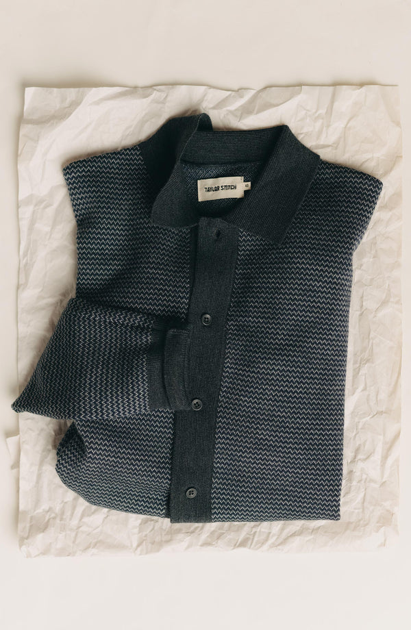 editorial flatlay of The Nichols Polo in Navy Birdseye Merino