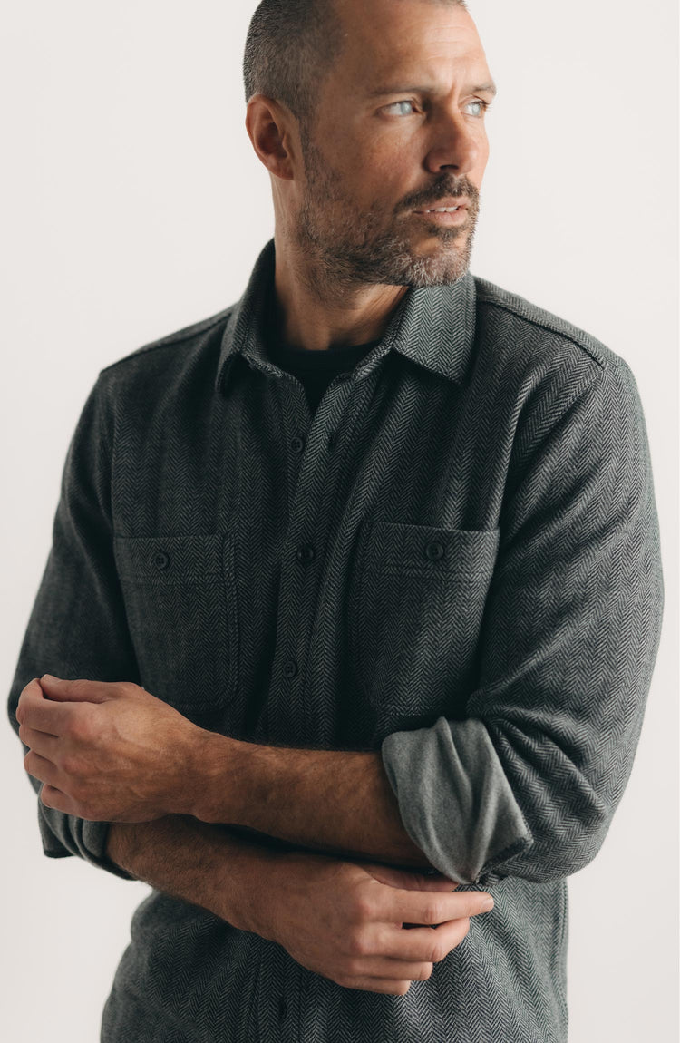 fit model posing in The North Shore Knit Shirt in Heather Coal