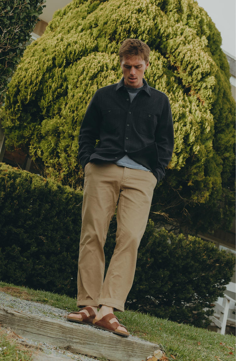 fit model posing in The North Shore Knit Shirt in Heather Navy