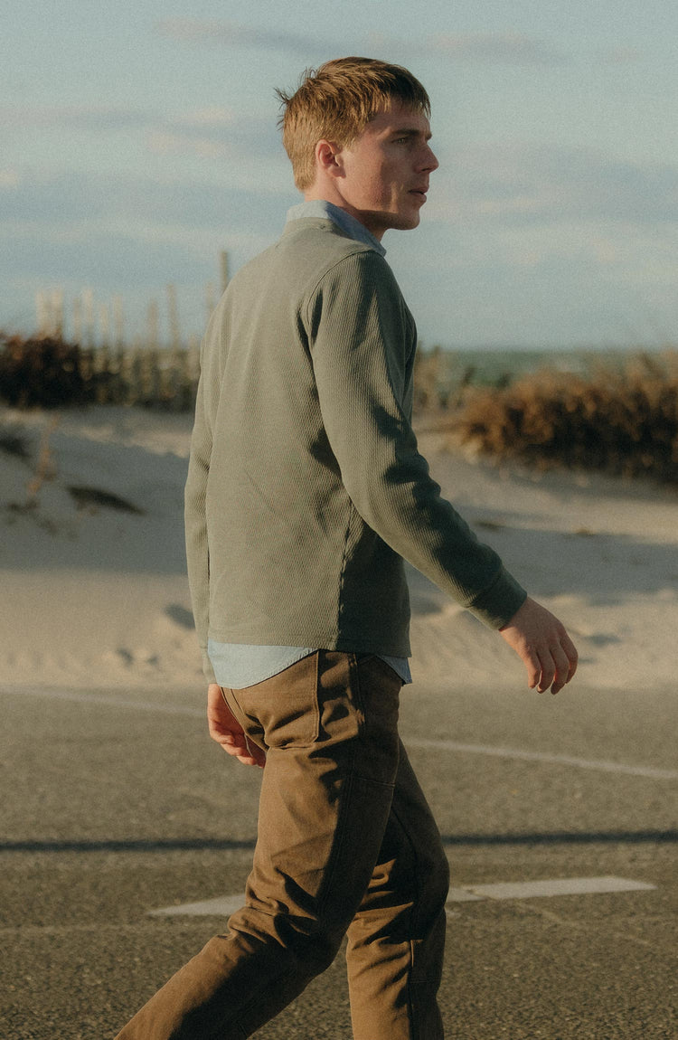 fit model walking wearing The Organic Cotton Crew in Deep Sea Waffle