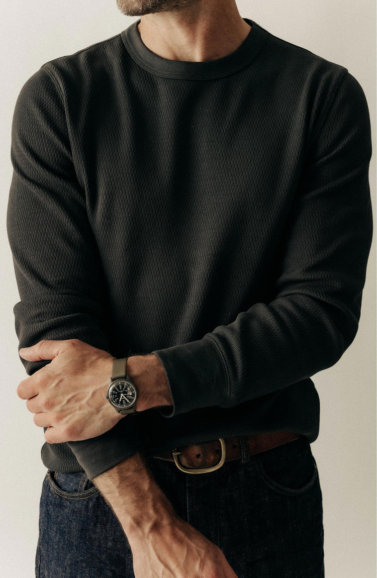 fit model posing in The Organic Cotton Crew in Faded Black Waffle