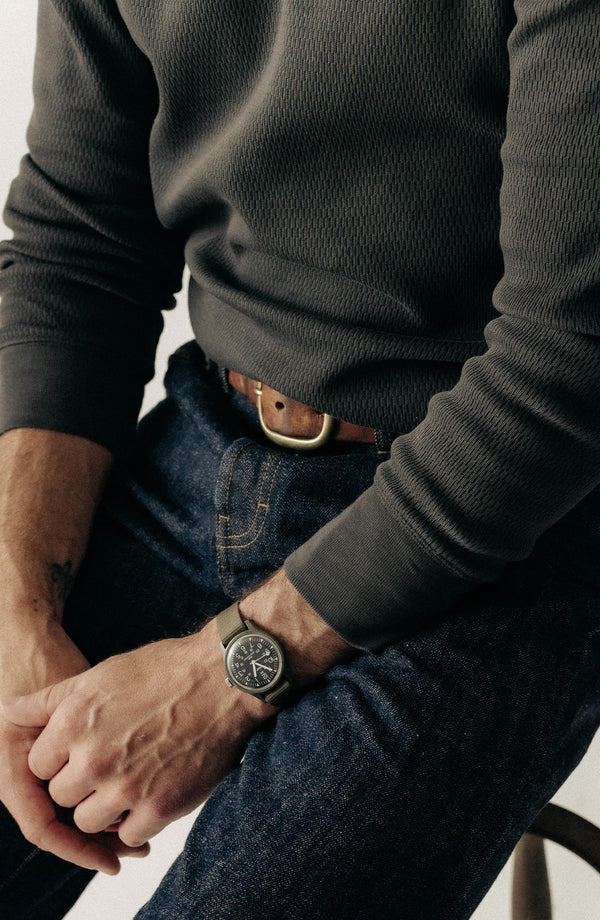 fit model showing off the sleeves on The Organic Cotton Crew in Faded Black Waffle