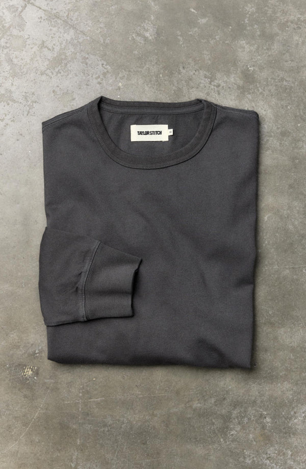 folded flatlay of The Organic Cotton Long Sleeve Tee in Faded Black
