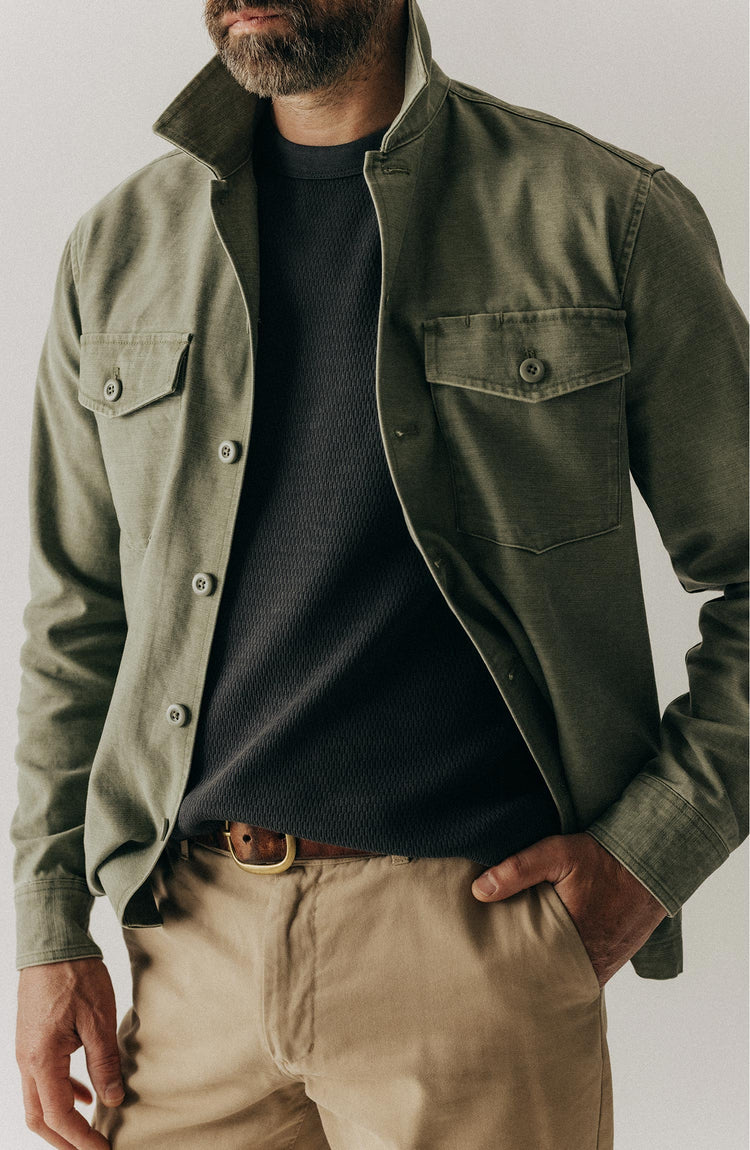 fit model in The Organic Cotton Waffle Short Sleeve Crew in Faded Black