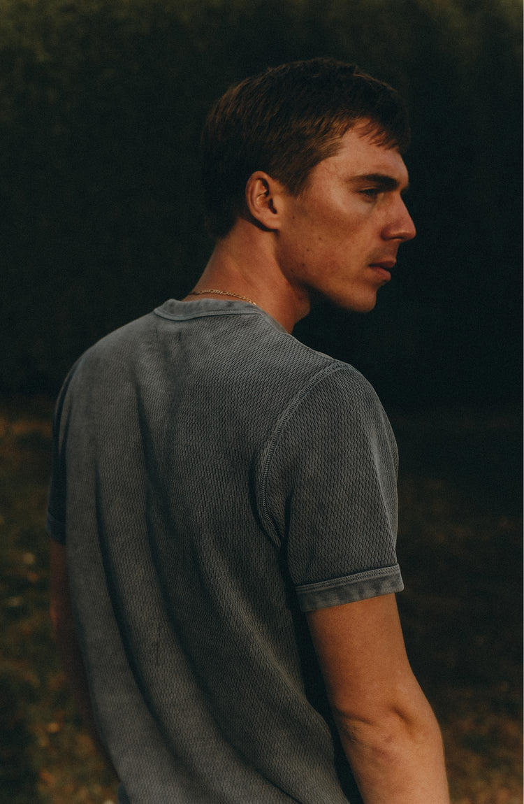 fit model posing in The Organic Cotton Short Sleeve Crew in Washed Blue Waffle