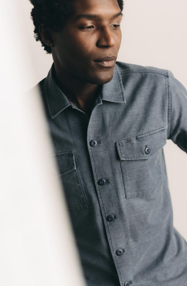 fit model showing off The Short Sleeve Surplus Shirt in Dark Navy Reverse Sateen