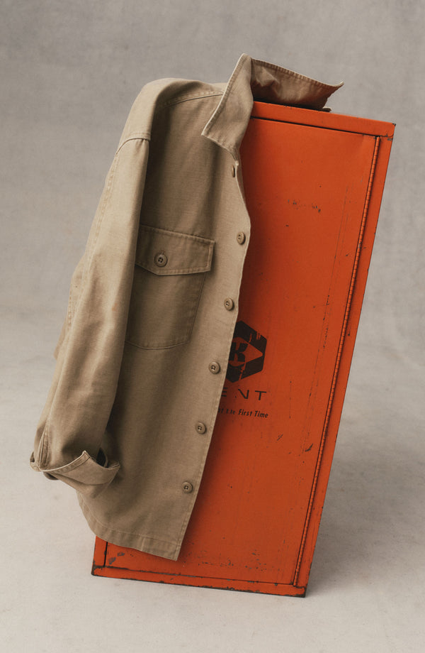 editorial image of The Surplus Shirt in Khaki Reverse Sateen on a rug