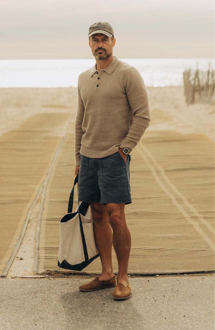 fit model showing off The Surplus Short in Dark Navy Reverse Sateen