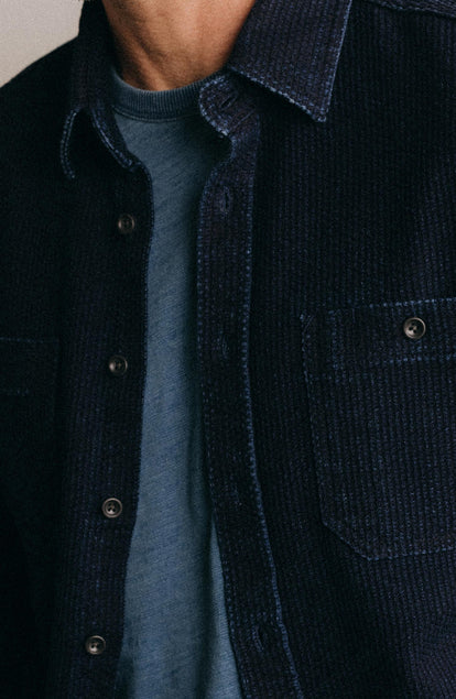 fit model showing off fabric on The Utility Shirt in Rinsed Indigo Sashiko