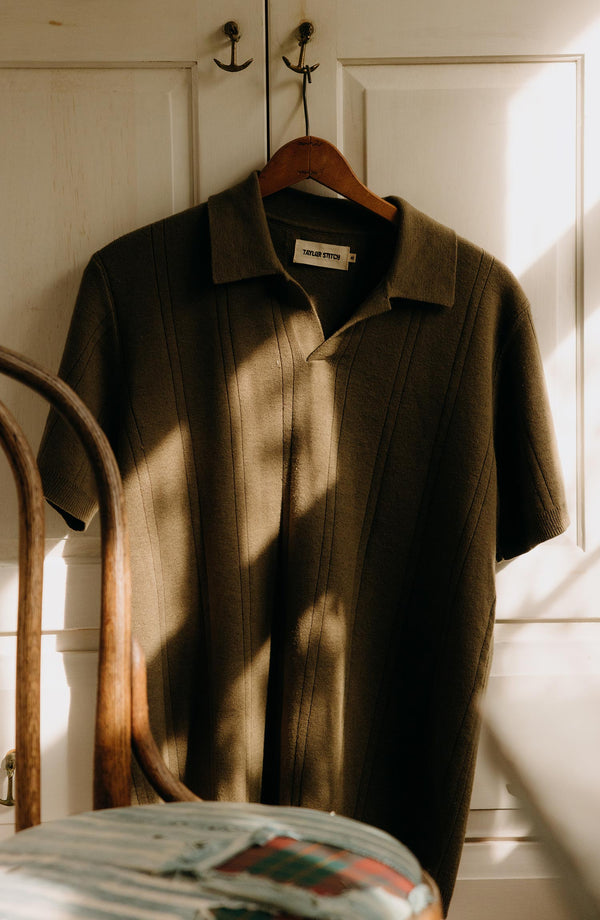 editorial image of The Valencia Sweater Polo in Heather Cilantro Rib hanging