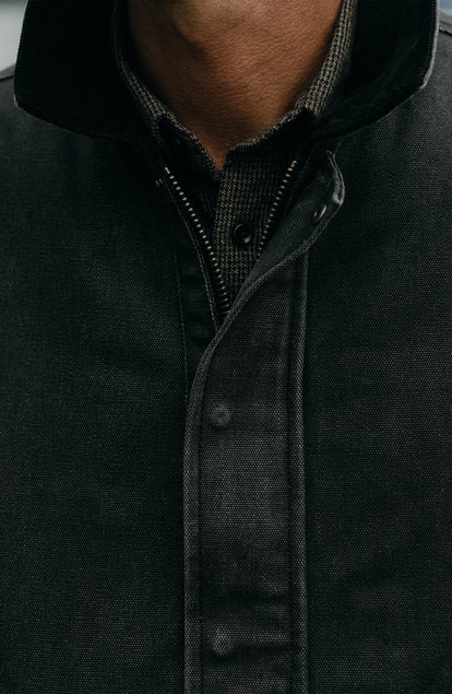 fit model showing off the zipper on The Workhorse Jacket in Coal Chipped Canvas