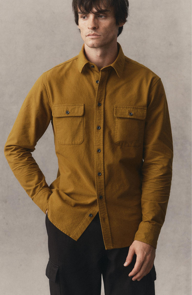 fit model posing in The Yosemite Shirt in Saffron