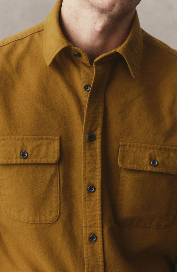 fit model showing off the buttons on The Yosemite Shirt in Saffron