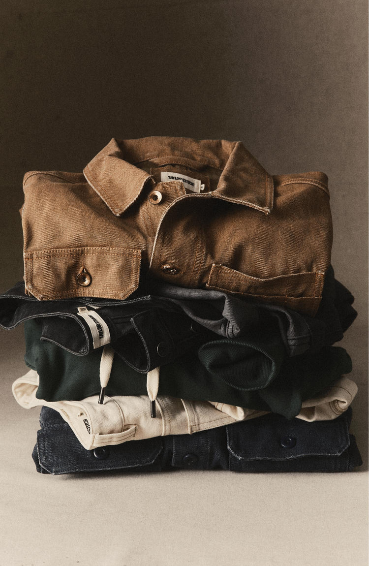 folded flatlay of various workwear products