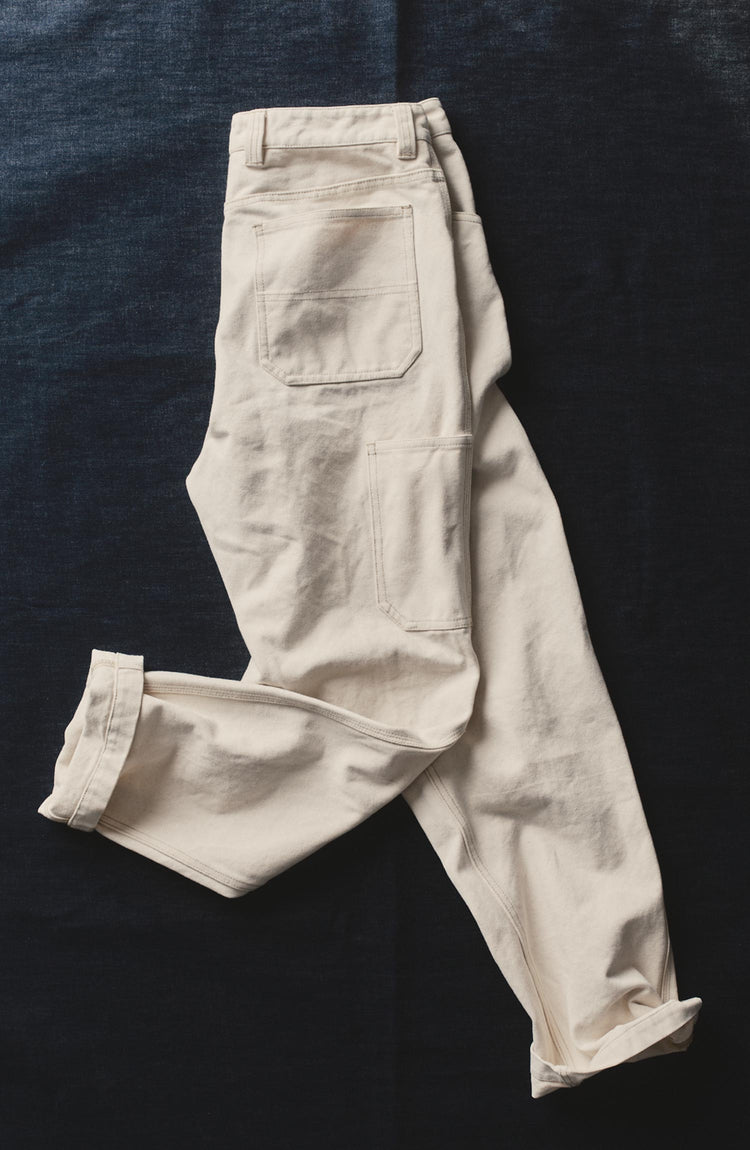 flatlay of The Painter Pant in Natural Seeded Chipped Canvas