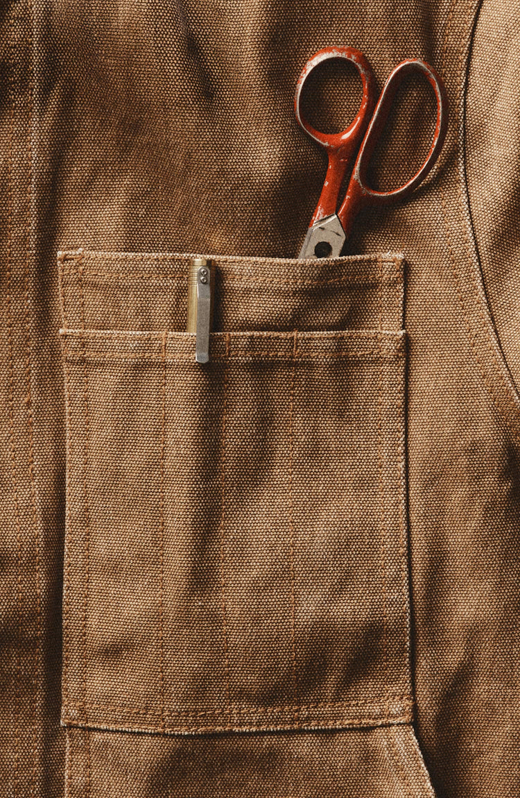 editorial image of the pocket of The Longshore Jacket in Tobacco Chipped Canvas