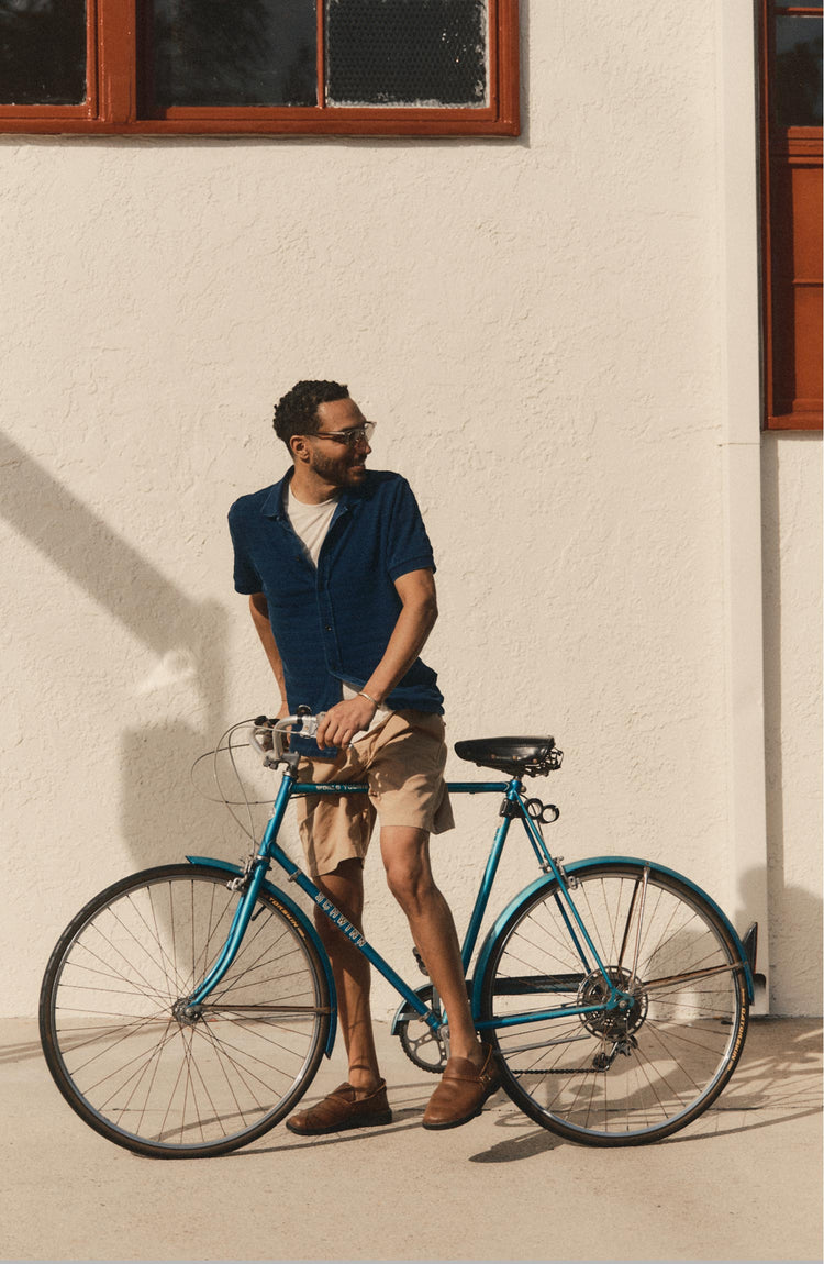 fit model posing in The Bywater Polo in Rinsed Indigo Knit Stripe