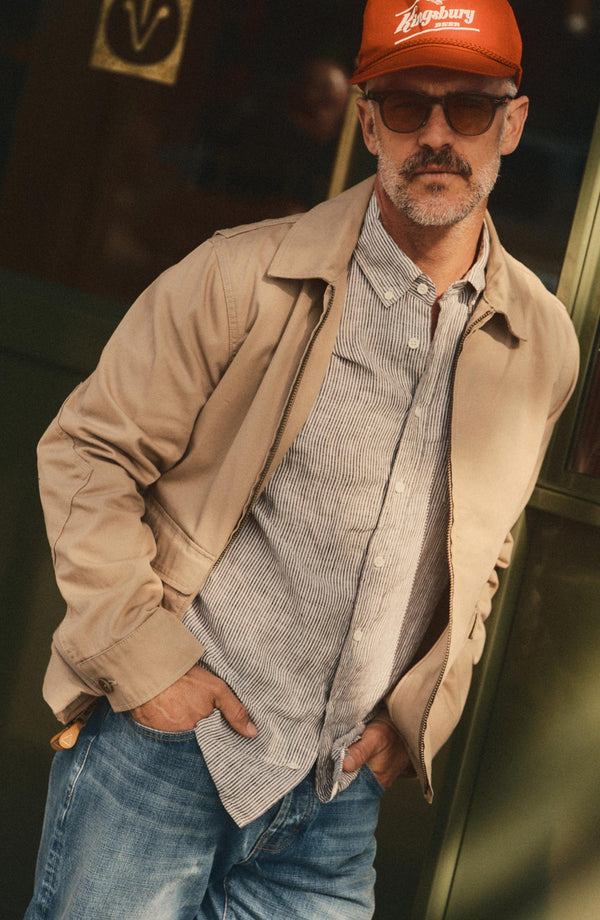 fit model showing off The Airman Jacket in Organic Khaki Foundation Twill