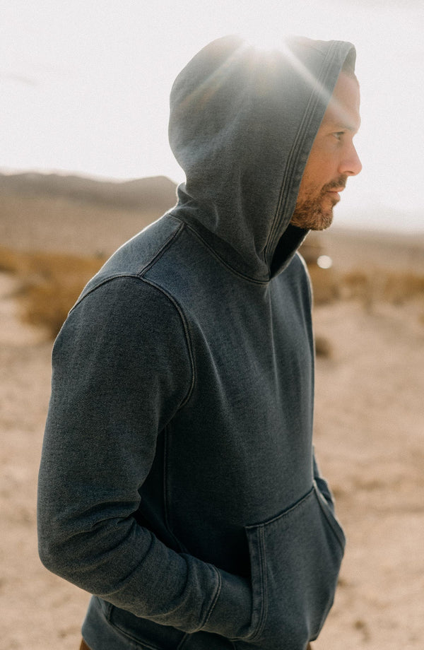 fit model showing off the hood on The Apres Hoodie in Washed Indigo Terry