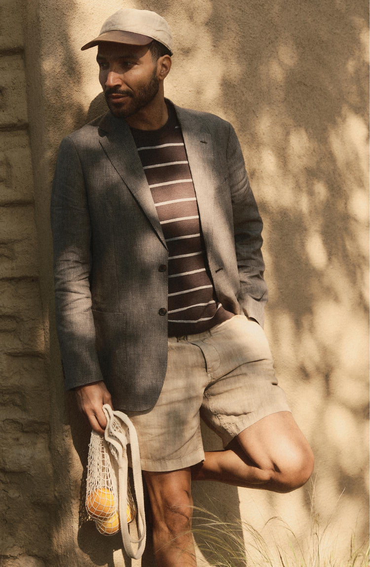 fit model posing in The Apres Short in Field Khaki Hemp