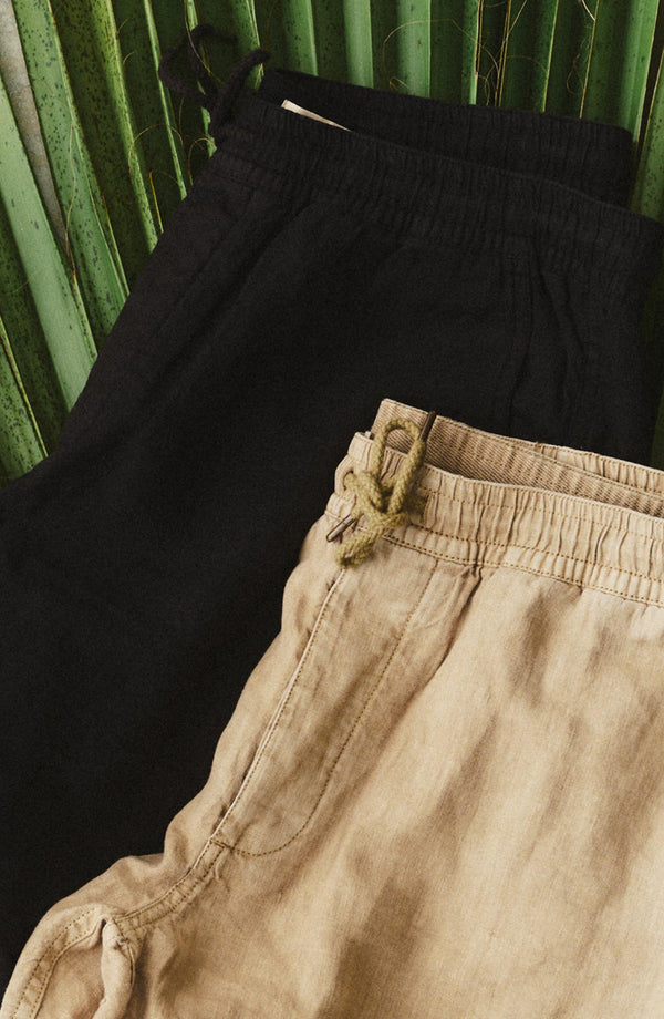 editorial flatlay of The Apres Short in Field Khaki Hemp