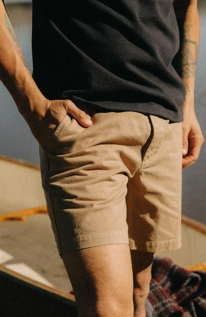 fit model with his hand in the pocket of The Apres Short in Organic Khaki Foundation Twill