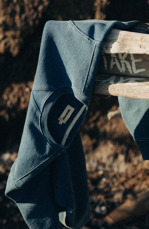 editorial image of The Apres Crew in Washed Indigo Terry hanging