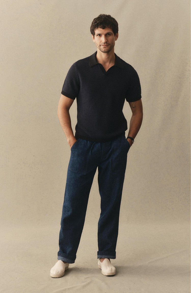 fit model posing in The Breakwater Pant in Rinsed Indigo Hemp Denim