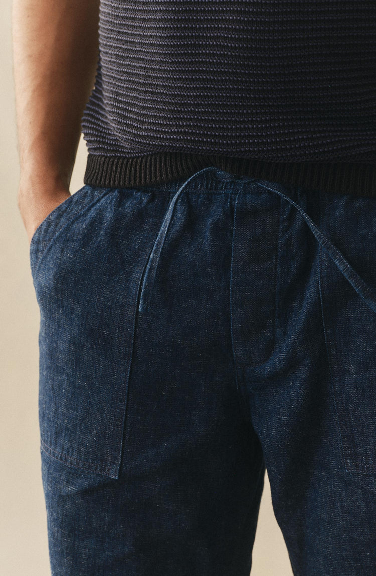 fit model showing off the waistband on The Breakwater Pant in Rinsed Indigo Hemp Denim