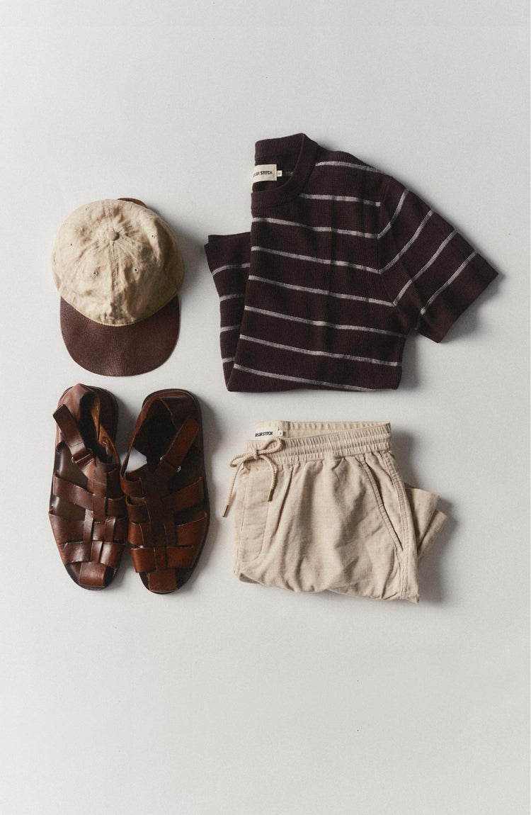 fit model showing off The Brody Sweater Tee in Espresso Stripe