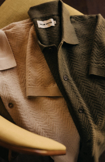 editorial flatlay of The Button Down Polo in Cilantro Herringbone