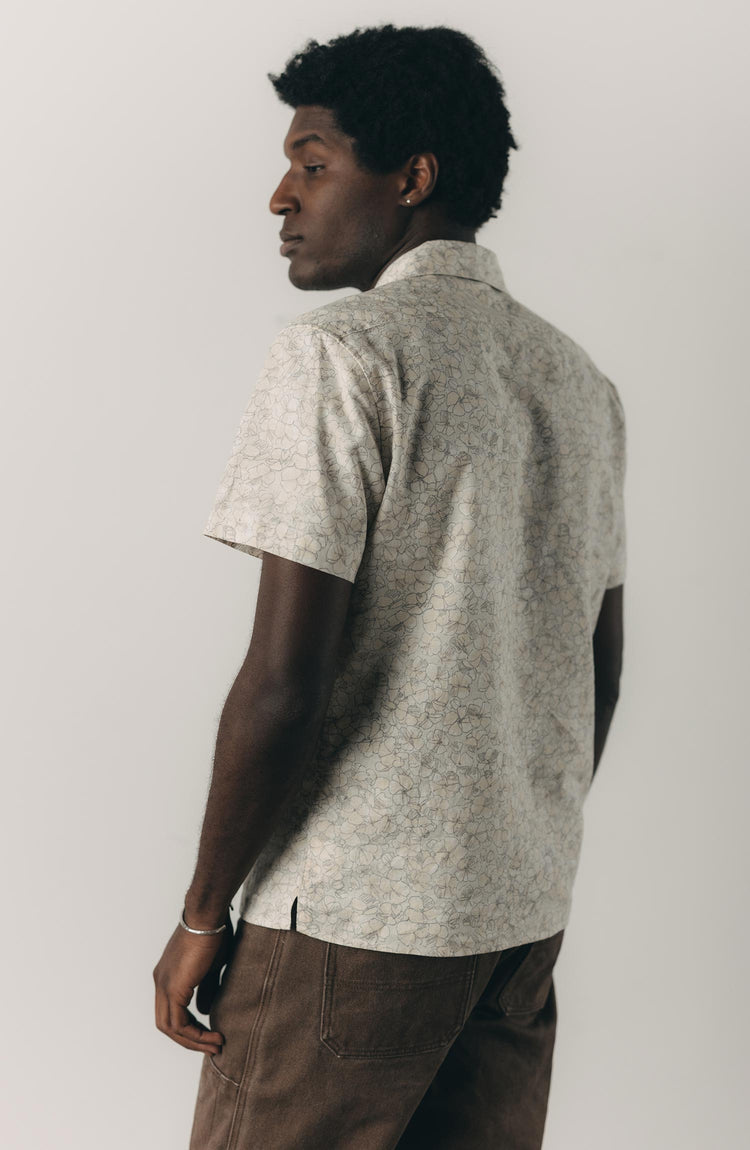 fit model posing in The Davis Shirt in Grey Skies Floral