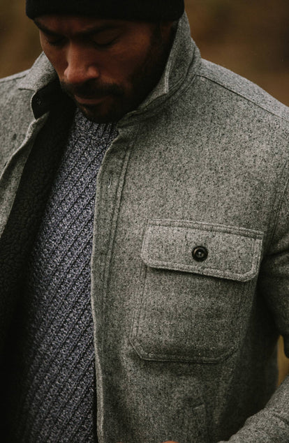Close up of model wearing The Chandler Jacket in Ash Donegal with hand in pocket