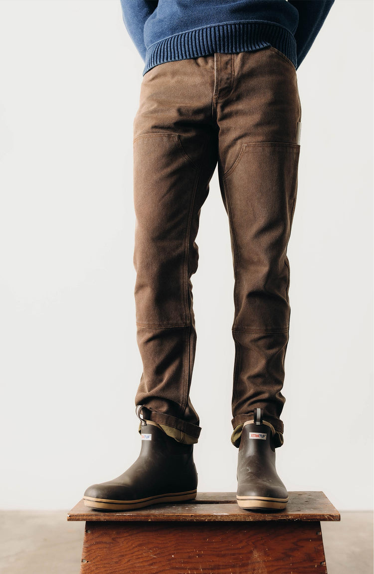 fit model posing in The Chore Pant in Aged Penny Chipped Canvas