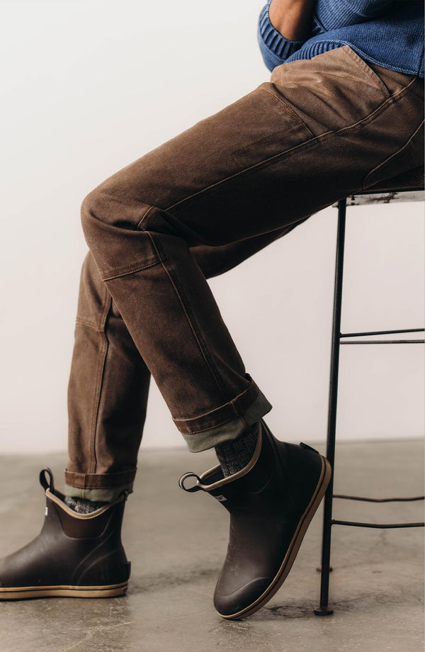 fit model showing off the cuffs on The Chore Pant in Aged Penny Chipped Canvas