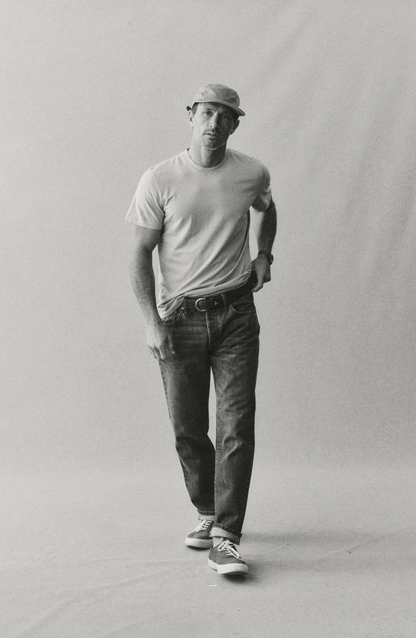 fit model walking wearing The Cotton Hemp Tee in Goldfinch