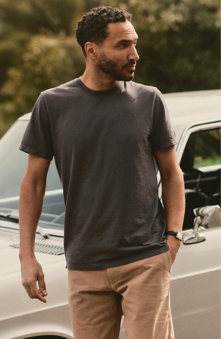 fit model posing in The Cotton Hemp Tee in Faded Black