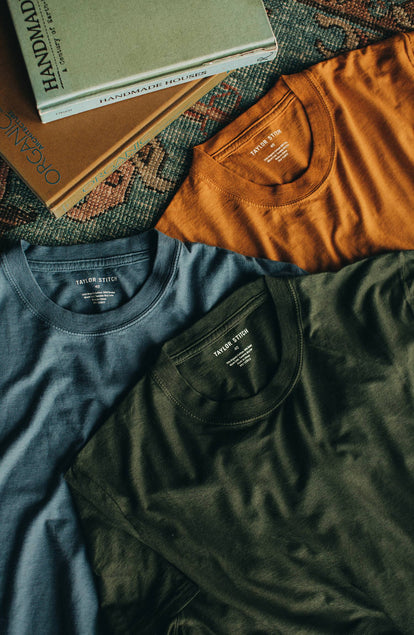 Image of 3 tee shirts on floor