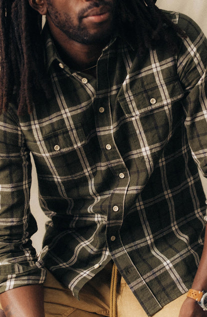 fit model posing in The Craftsman Shirt in Canteen Plaid Linen