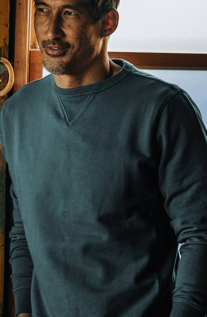 our guy rocking the crewneck in maine, cropped shot with text on the right