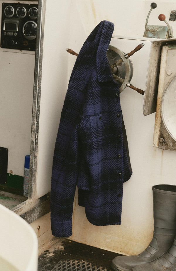 editorial image of The Cutter Overshirt in Lighthouse Check hanging